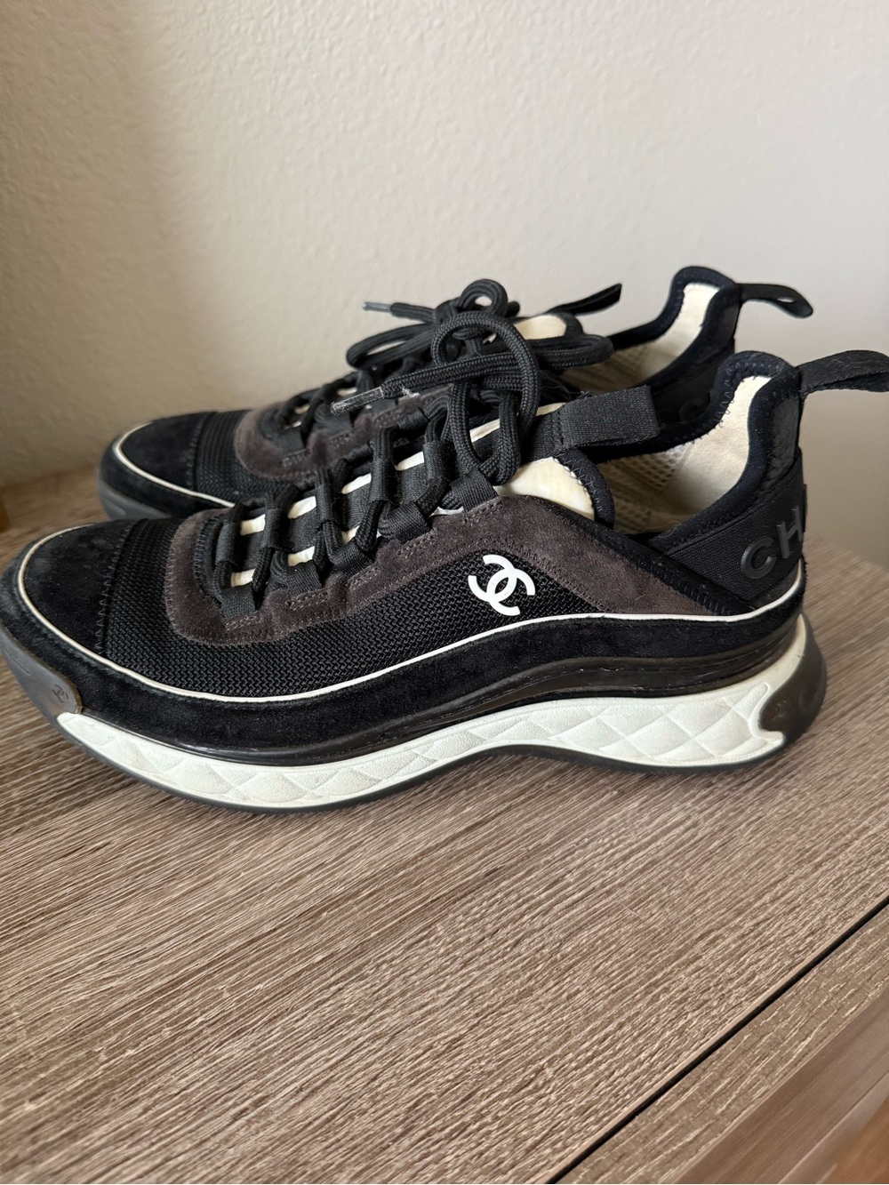 CHANEL Black and White Interlocking CC Runner Sneakers